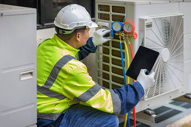 Professional Heat Pump Repair technician working in Kaaawa, HI
